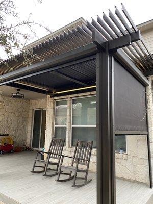 Motorized louvered roof system open with Screens