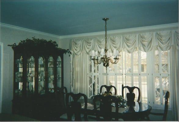 Replace wallpaper and added new draperies in dinin rioom