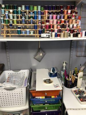 Sew supplies & work table.