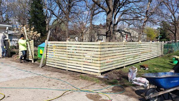 Treated wood fence built it in Richfield yard for a fantastic client.