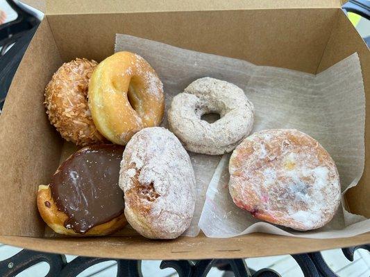 Toasted coconut, honey dipped, cinnamon sugar, chocolate dipped banana creme, apple filled, raspberry filled