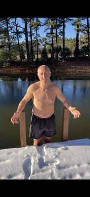 Practicing cold therapy with a winter swim in the pond... Made popular by Wim Hof.