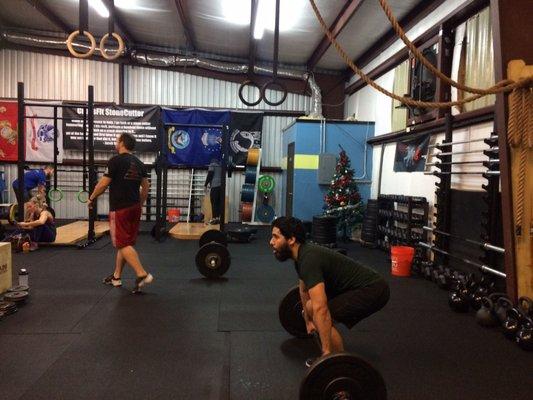 Love this place!  My hubby hard at work during today's intense WOD.