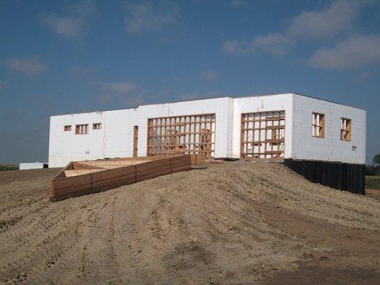 ICF to the roof with living space under the garage.