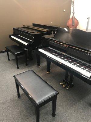 Double piano room where she takes her lessons!