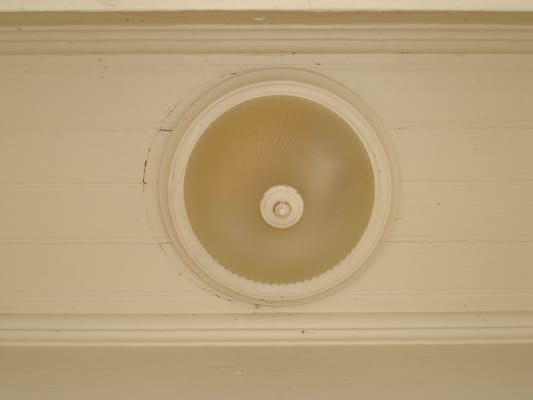 Front Porch Light Installed Off Center in the Soffit