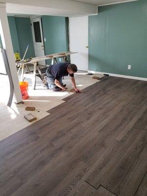 Marlon lays vinyl plank flooring!