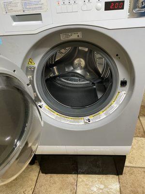 Washer after having to pull out clothes and drain in sink and then throw into another washing machine