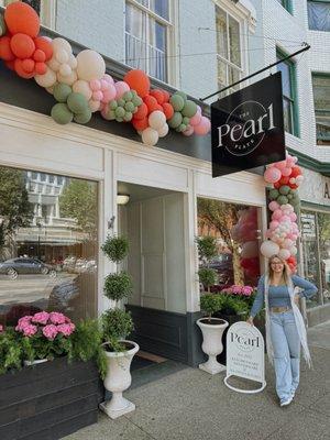 Tyler, owner, in front of The Pearl Plate on their Grand Opening at 214 East Main Street on May 24th, 2024