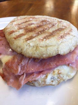 Hot delicious breakfast sandwich always hits the spot. Ham, egg & extra sharp cheddar.