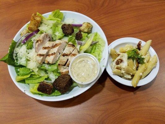 Chicken caesar salad and three cheese penne side