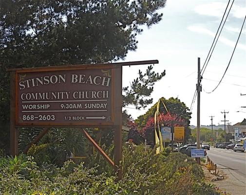 Sign on Highway 1. The church is half a block away.