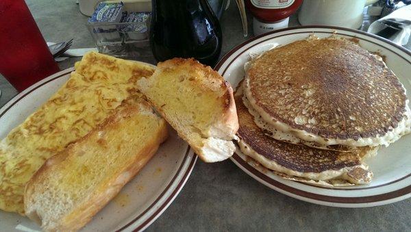 Cheese omelette with home made toast and pancakes. Definitely should try the home made toast.