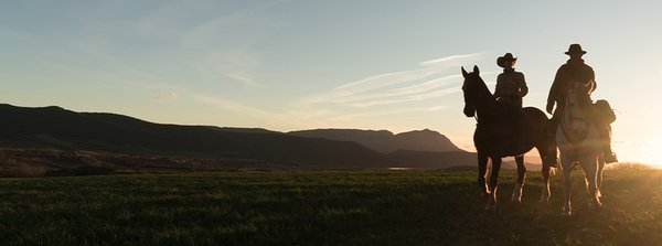 Cowboys on open plains