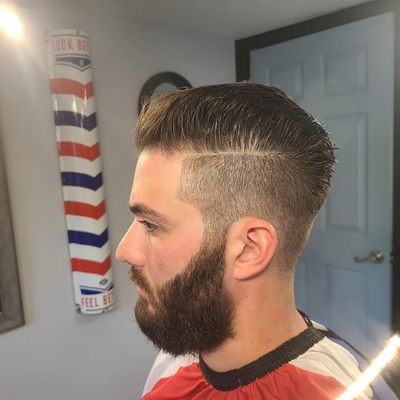 Haircut blended into beard.