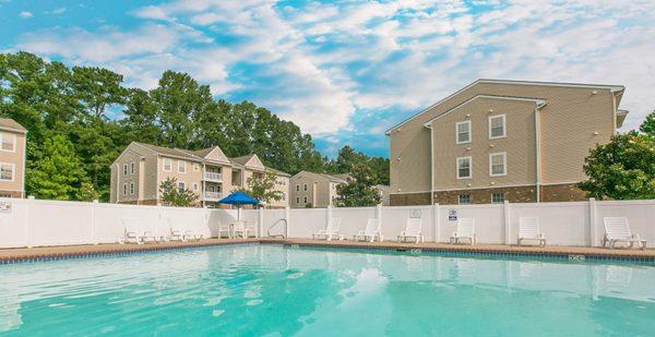 Sun sparkling swimming pool