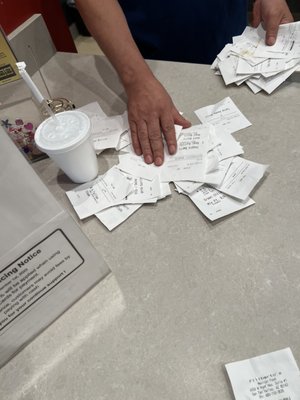 Digging through order slips when I saw him throw my slip in trash.