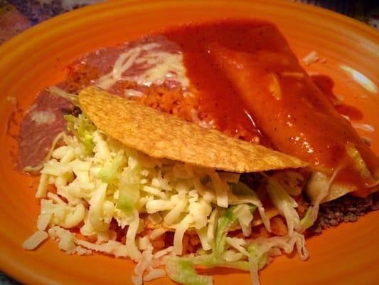 Lunch special with a taco, enchilada, rice and beans.