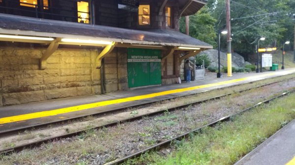 Looking at the outbound platform of Kiosks at Newton Highlands MBTA Station