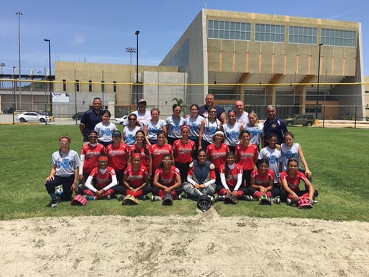 Our 14u team with their opponents after the game in Puerto Rico.