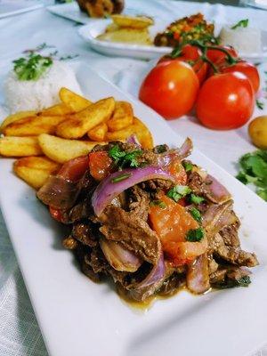 Sirloin steak" Lomo saltado " Peruvian flavor to your house