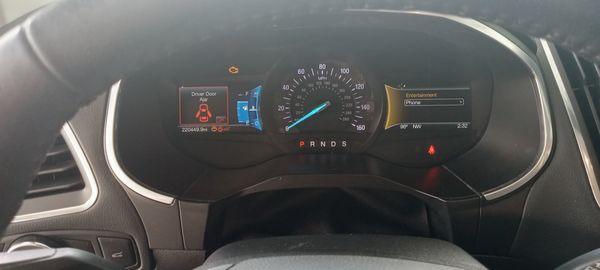 2018 Ford Edge with mileage shown.