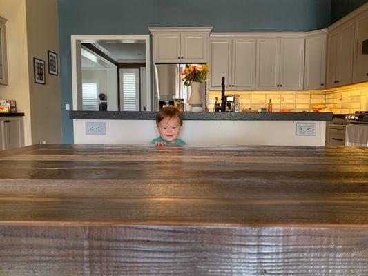 Our kitchen after! With a nice reclaimed wood table made by Poppa's barn! Mike did a great job at making this table.