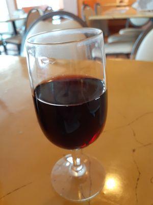 Italian food is great with a glass of vino....red wine Free with coupon  from local newspapers