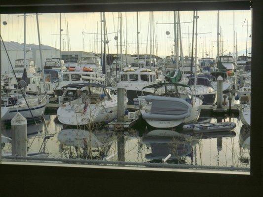 View through one of four large picture windows right on the harbor marina