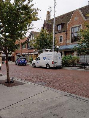 ABC 7 news reporting live on Westgate St in OP on Covid-19 recent surge in suburban Cook County and latest business restrictions.