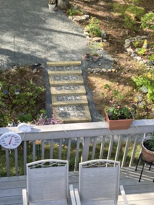 Installed backyard decorative steps with stonework.