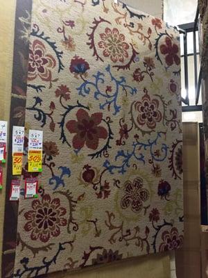 Tons of area rugs.