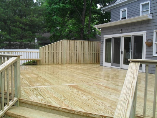 Wood decking with privacy wall. Installed fall 2014