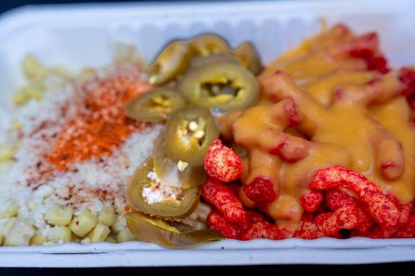 Combo plate.  Hot cheetos and cheese and Esquites