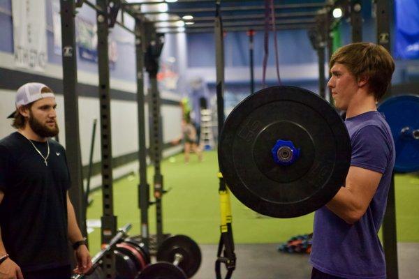 Coach Zack working with one of our athletes