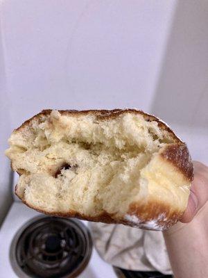 Ponchyky powdered jelly donut