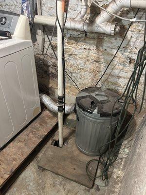 Improper ejector pit that is not sealed or vented in a basement. This can allow sewer gas odor to enter the living portion of the home..