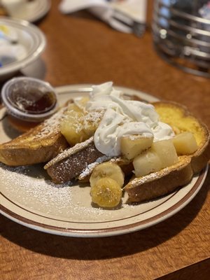 Hawaiian  French toast super yummy shredded coconut bananas pineapple whip cream a little runny but good