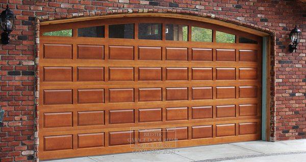 We install wooden garage doors.