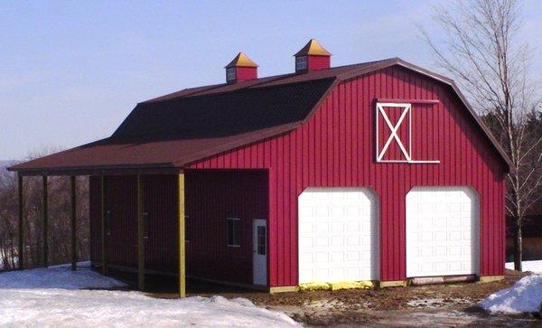 Gambrel style barn with porch