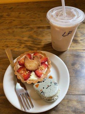 matcha black sesame meowcarons and mini custard tart with strawberries, london fog iced latte