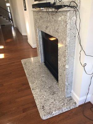 Mayflower White granite fireplace