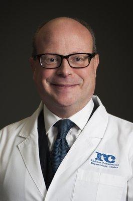 Dr. Charles Love, Board Certified Dermatologist and Mohs Surgeon with Iowa Dermatology