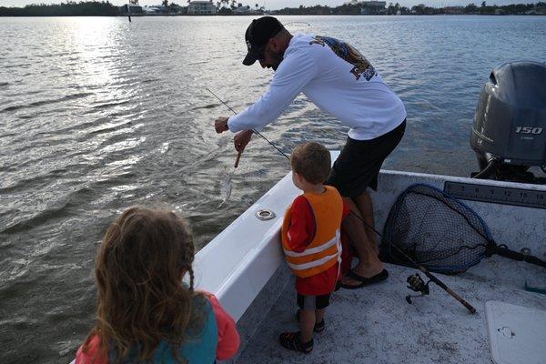 Captain Dylan helping the kids