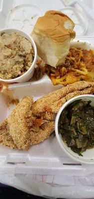 Fried Carfish, spaghetti, dressing with gravy, collared greens, dinner roll