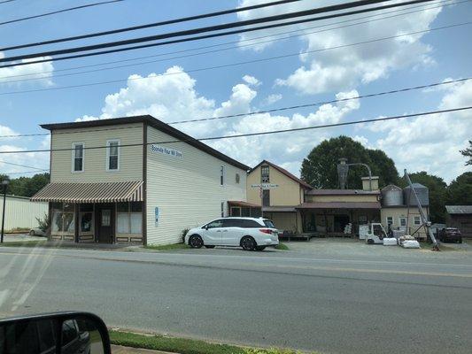 Street view of store and mill.