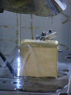 Maskinell's EDM (Electrostatic Discharge Machining) of a brass cube. Maskinell does prototyping, molds, non-prismatic CNC,...