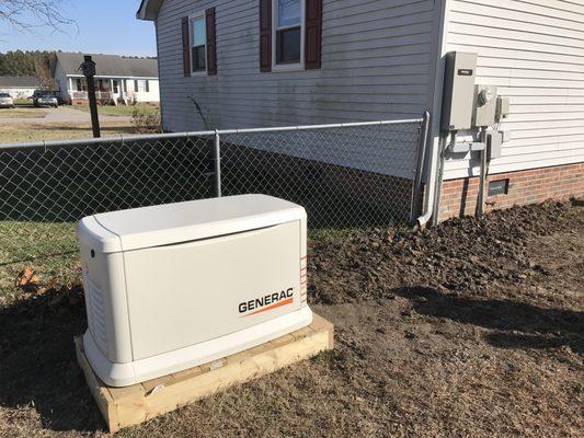 22 Kw Generac whole-house generator with automatic transfer switch installation.