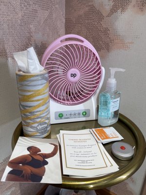 Sanitizer table with , assistance bell, fan , store information etc