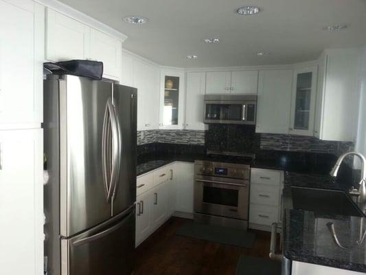 White Shaker Cabinets, Blue Pearl Counter Top